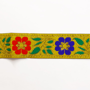 Тесьма 40 мм жаккард с люрексом желтый с красными и синими цветами