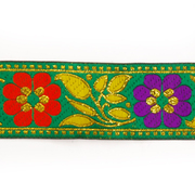 Тесьма 40 мм жаккард с люрексом зеленый с красными и синими цветами