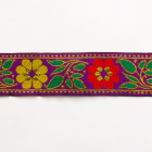 Тесьма 40 мм жаккард с люрексом фиолетовый с красными и желтыми цветами в интернет-магазине Швейпрофи.рф
